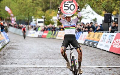Fem van Empel marks her 50th cyclocross win at the muddy Exact Cross event, featuring a concealed handmade sign in her gear.